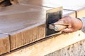 Construction Worker Using Stainless Steel Edger On Wet Cement Forming Coping Around New Pool Royalty Free Stock Photo