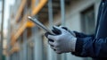 Construction Worker Using Tablet on Site Royalty Free Stock Photo