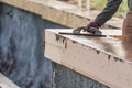 Construction Worker Using Wood Trowel On Wet Cement Forming Coping Around New Pool Royalty Free Stock Photo