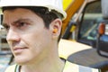 Construction Worker Wearing Protective Ear Plugs Royalty Free Stock Photo