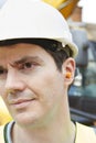 Construction Worker Wearing Protective Ear Plugs Royalty Free Stock Photo