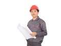 A construction worker wearing a red hard hat is holding drawing in front of a white background Royalty Free Stock Photo