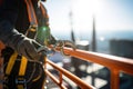 Construction Worker Wearing Safety Harness and Safety Line Masterfully Working at High Place. created with Generative AI Royalty Free Stock Photo