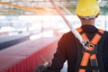 Construction worker wearing safety harness and safety line Royalty Free Stock Photo