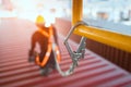 Construction worker wearing safety harness and safety line Royalty Free Stock Photo