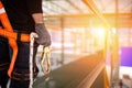 Construction worker wearing safety harness and safety line Royalty Free Stock Photo