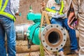 Construction worker welding underground valve gas Royalty Free Stock Photo