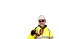 construction worker in a white hat, yellow hi-viz coat and dark tinted safety glasses on the white background gives foam-filled