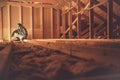 Construction Worker and the Wooden House Attic Royalty Free Stock Photo