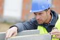 construction worker working with cement block measurement Royalty Free Stock Photo