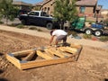 Construction worker working on the framing process for a new a house Royalty Free Stock Photo