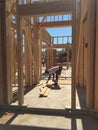 Construction worker working on the framing process for a new a house Royalty Free Stock Photo