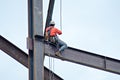 Construction worker working on highrise building