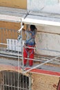 Construction worker working on the rehabilitation of an old house