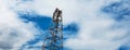 Construction worker working on scaffolding with ladder on building site and beautiful cloud, sky background