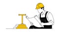 A construction worker in a yellow hard hat sitting and reading blueprints next to a large tshaped level on a stack of blocks Royalty Free Stock Photo