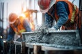 Construction Workers Pouring Concrete into Beam Formwork on Site Royalty Free Stock Photo