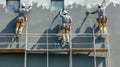 Construction Workers Applying Stucco to Building Facade Royalty Free Stock Photo