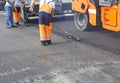 Construction workers on asphalting