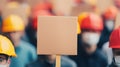 Construction Workers with Blank Signs in Protest Rally Setting Royalty Free Stock Photo