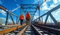 Construction workers on a bridge under a blue sky Royalty Free Stock Photo