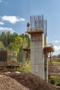Construction workers building concrete bridge support pillars in D11 near Bernartice, Czechia Royalty Free Stock Photo