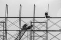 Construction workers building on scaffolding Royalty Free Stock Photo