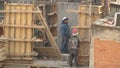 Construction Workers on Building Site