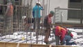 Construction Workers on Building Site