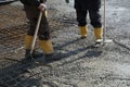 construction workers. concrete construction. boots Royalty Free Stock Photo