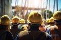 Construction workers at construction site outdoors, labor wearing yellow safety hardhats. Generative AI