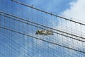 Construction workers crew repair cables on the Brooklyn Bridge Royalty Free Stock Photo