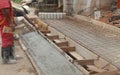 Construction workers engaged in concrete work, at a building site, Lagos Nigeria Royalty Free Stock Photo