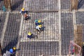 Construction workers fabricating large steel bar reinforcement bar at the in construction area building site