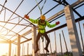 Construction workers fall from a height but have safety to help. Concept of preventing danger from heights with Safety on the Royalty Free Stock Photo