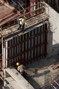 Construction workers at high-rise building