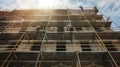 Construction workers on high-rise scaffolding, safety equipment, urban development, construction industry concept Royalty Free Stock Photo