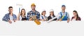 Construction workers holding blank billboard Royalty Free Stock Photo