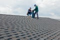 Construction workers Installing chimney and building construction concept. Royalty Free Stock Photo