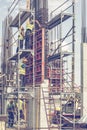 Construction workers installing concrete pillar mold 3