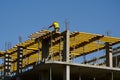 Construction workers installing mounting horizontal formwork on the building construction site. Royalty Free Stock Photo