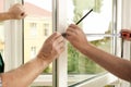 Construction workers installing new window Royalty Free Stock Photo