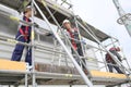 Construction workers installing scaffolding Royalty Free Stock Photo