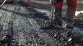 Construction workers are laying new asphalt road pavement at a construction site in a residential area, Ai Generated