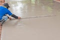 Construction workers leveling concrete Royalty Free Stock Photo