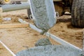 Construction workers mixer truck cement during pouring sidewalk Royalty Free Stock Photo