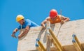 Construction workers nailing formwork in place Royalty Free Stock Photo