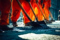 Construction workers paving a road with asphalt during daylight Royalty Free Stock Photo