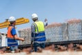 Construction Workers Planning Infrastructure Development, Engineers Team Discussing Project Progress at Construction Site, Multi- Royalty Free Stock Photo