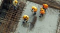 Construction Workers Pouring Concrete on a Building Site Royalty Free Stock Photo